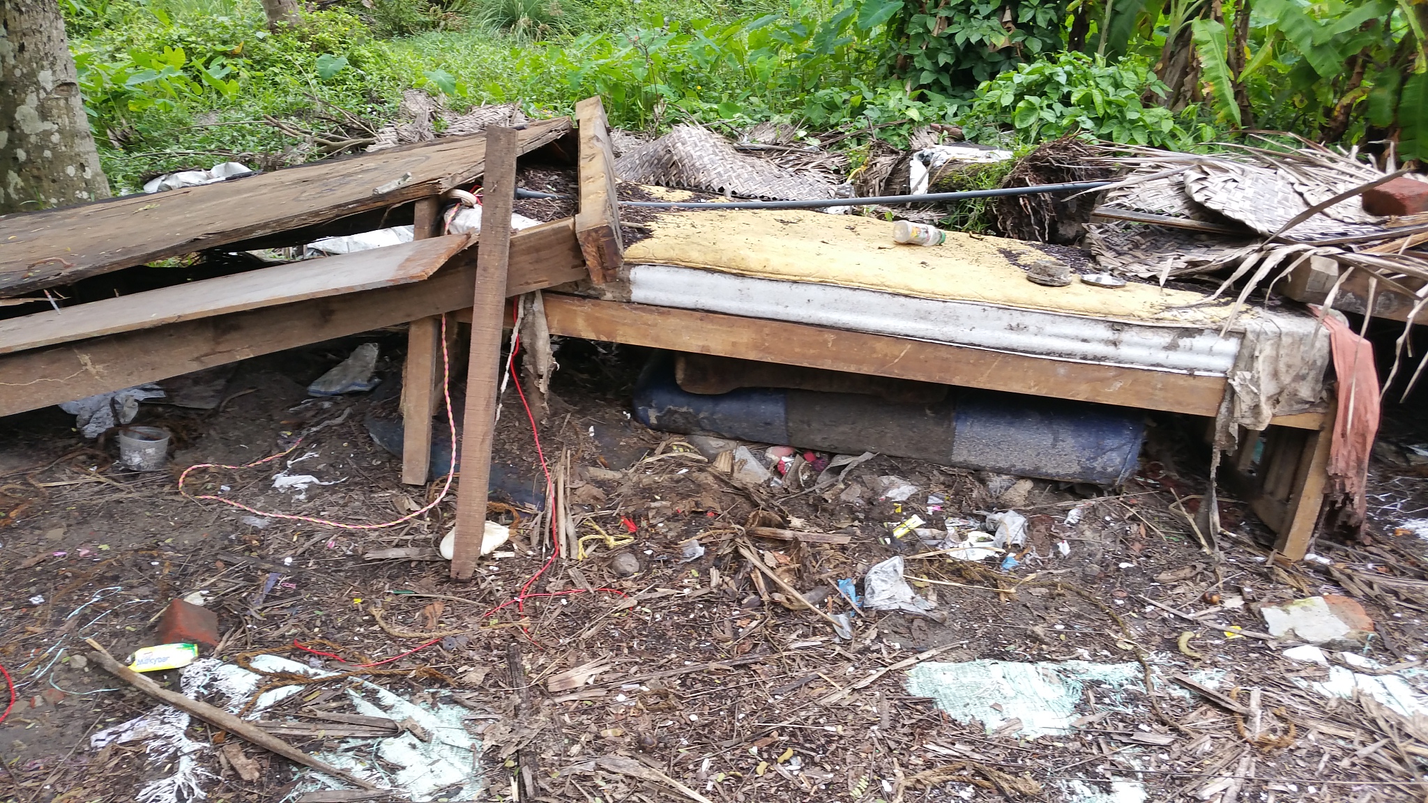 House damaged by the floods in a Trivandrum slum